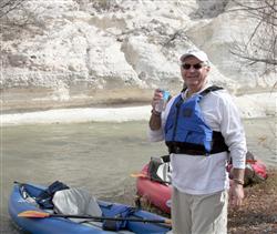 Camp Verde Chamber Director Roy Gugliotta below the White Cliffs of Camp Verde